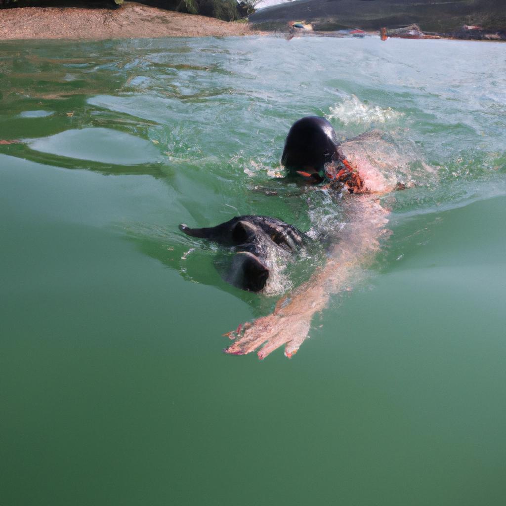 Person swimming with pet dog